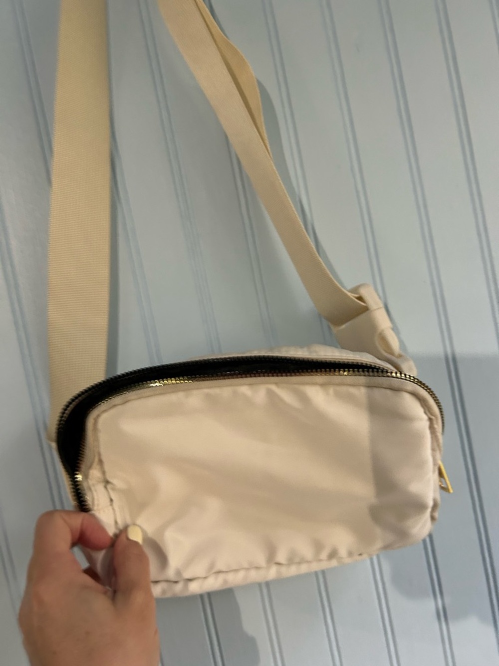 Cream Crossbody Sling Bag with Adjustable Strap. Can be used as a belt bag